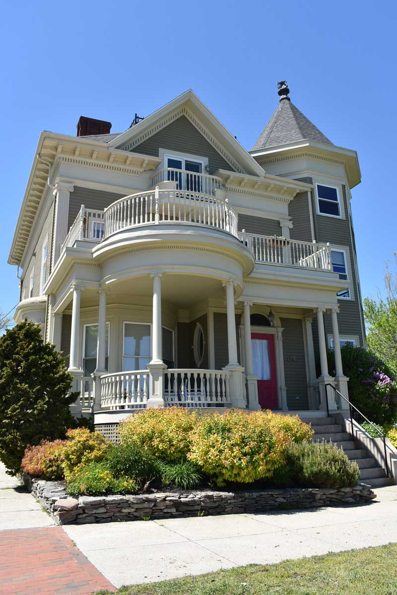 soffit-fascia-feature1 old large white and grey house with detailed trim